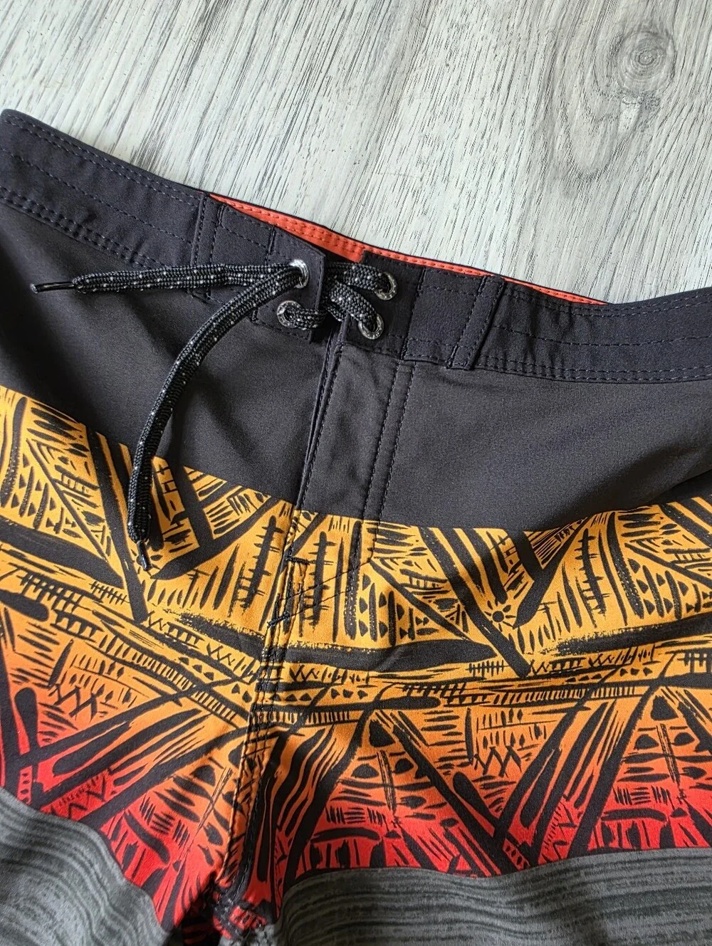 Ron Jon Black, Orange and Red Tribal Board Shorts